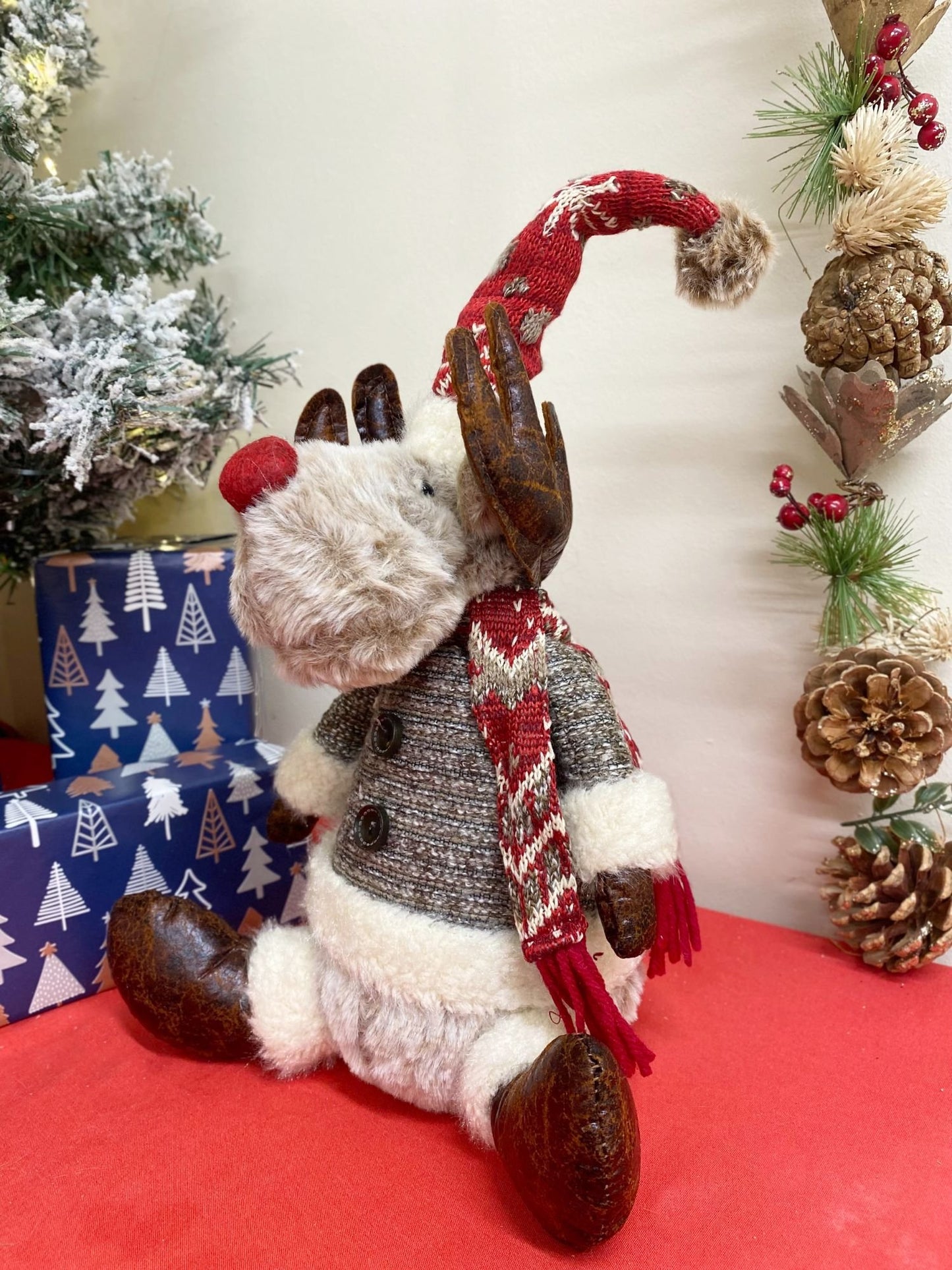 Sitting Reindeer With Knitted Coat